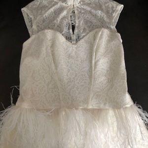 Bebe peplum top feather